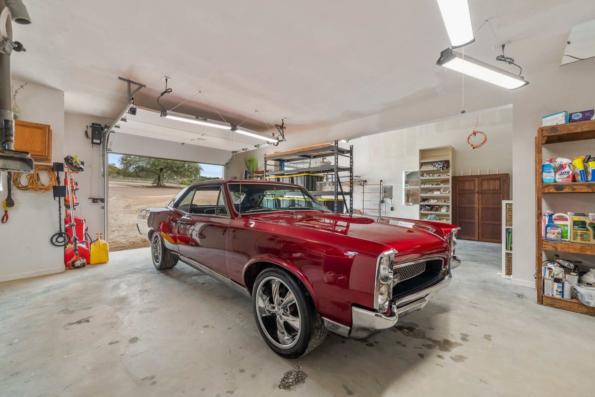 401 Ranchview Drive Johnson City, TX 78636 - Photo 29 of 40 Roll up garage doors & extra deep space
