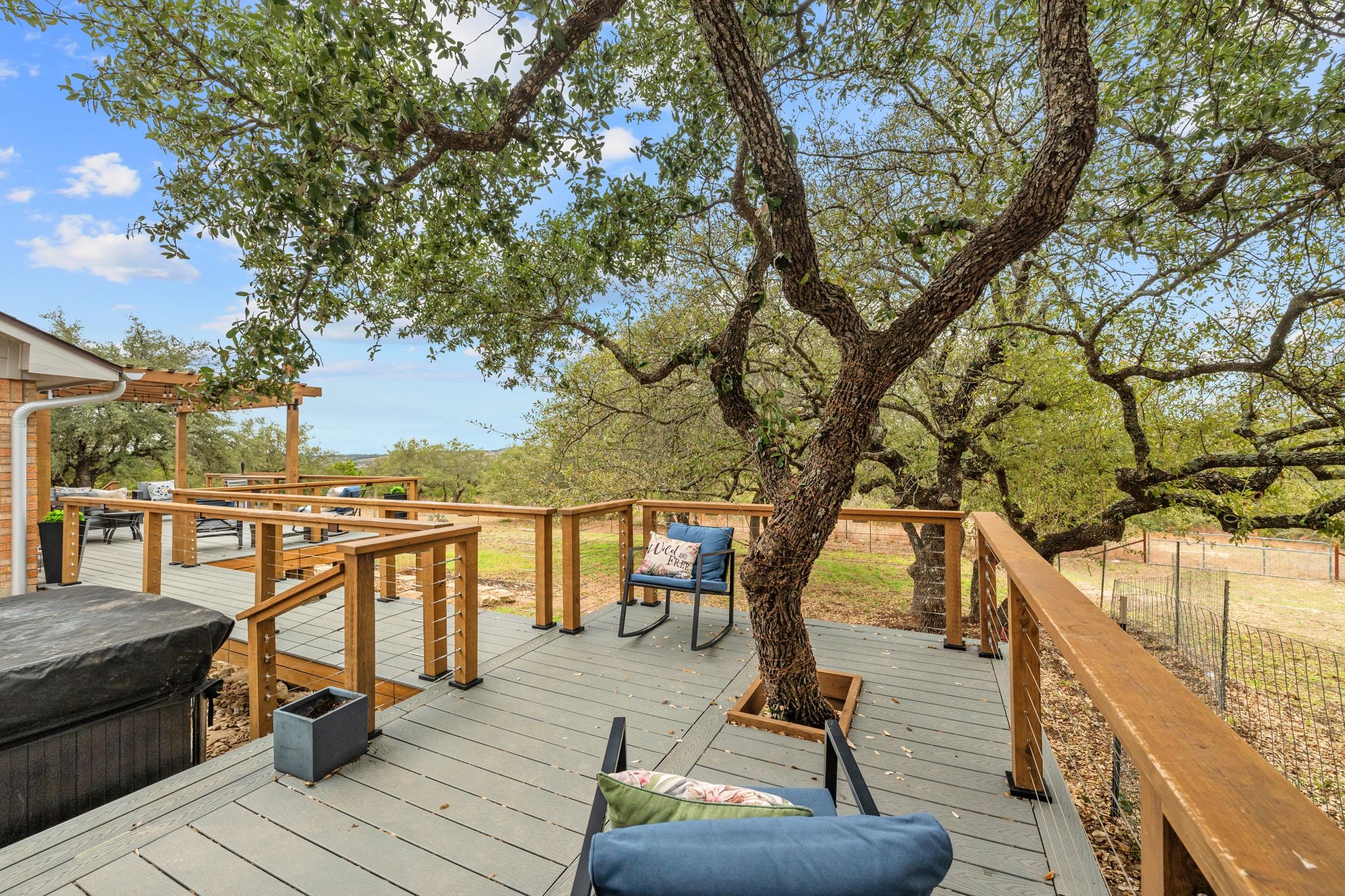 401 Ranchview Drive Johnson City, TX 78636 - Photo 34 of 40 Tree integraged deck for natural shade