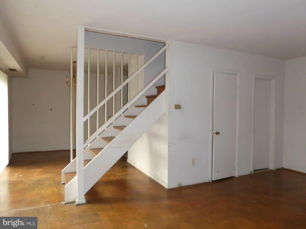 8706 Manchester Road, Unit 6 Silver Spring, MD 20901 - Photo 4 of 12 a view of entryway and hall with wooden floor