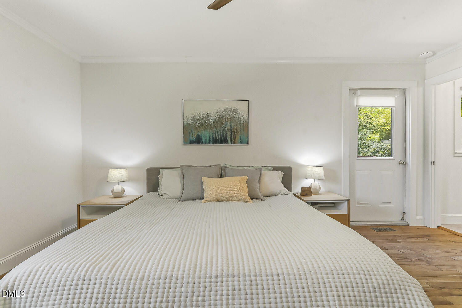 3704 Swann Street Raleigh, NC 27612 - Photo 10 of 21 a bedroom with a bed and a window