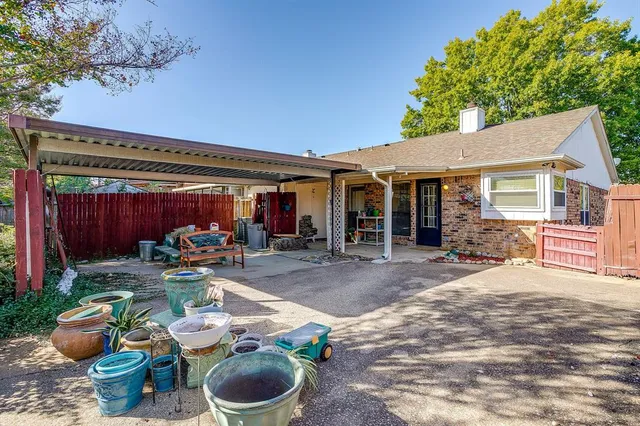 a outdoor living space with patio furniture and a potted plant