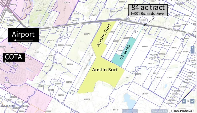 a sign on a street next to a road