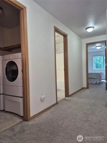 a view of a storage & utility room with washer and dryer