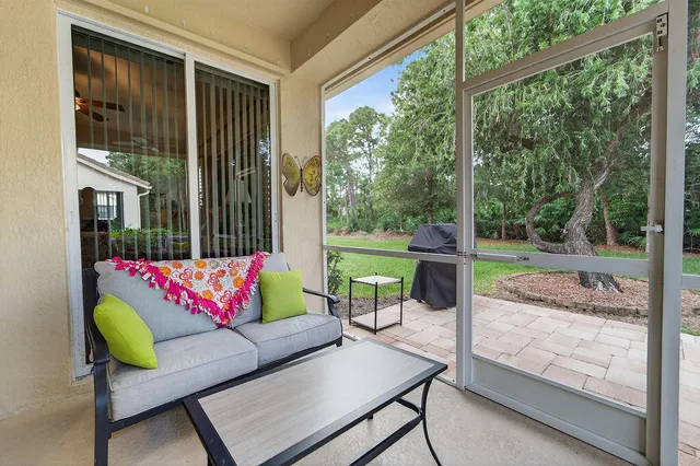 a outdoor living space with furniture and garden view