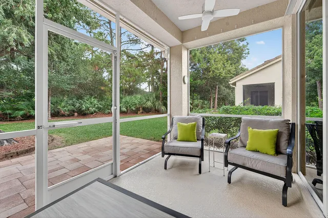 a view of a patio with a backyard