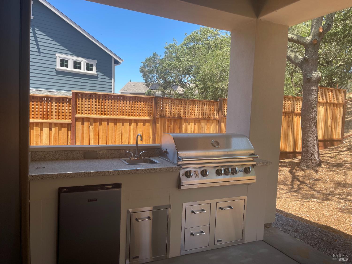 1913 Carlile Place Santa Rosa, CA 95403 - Photo 7 of 10 a kitchen with a stove and cabinets