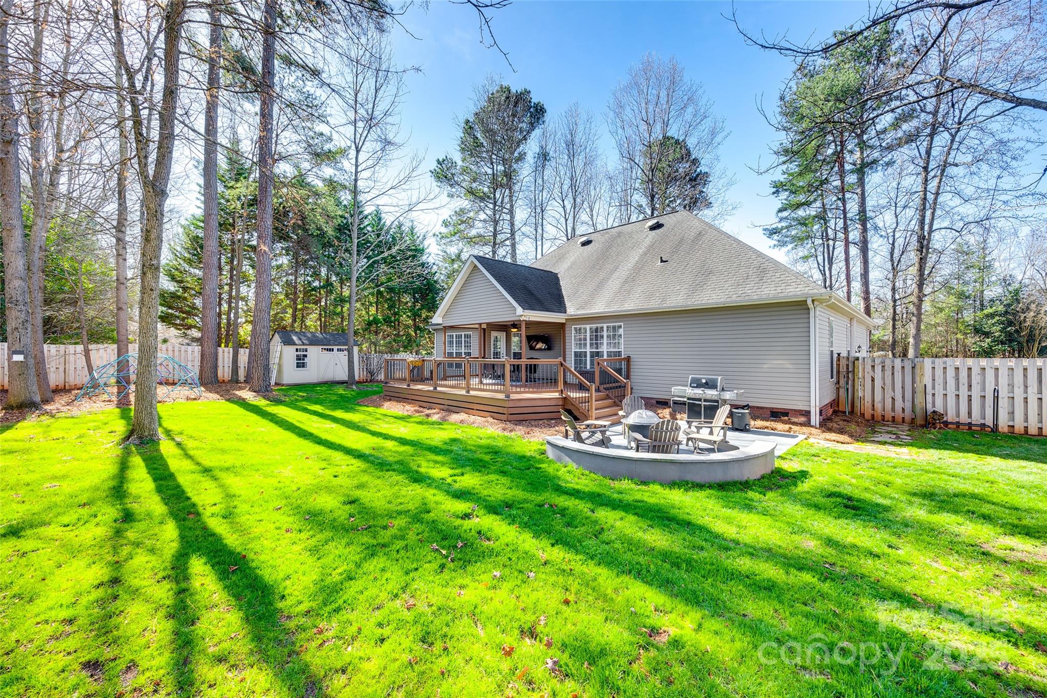 1352 North Dobys Bridge Road Fort Mill, SC 29715 - Photo 28 of 31 a view of a house with backyard and sitting area