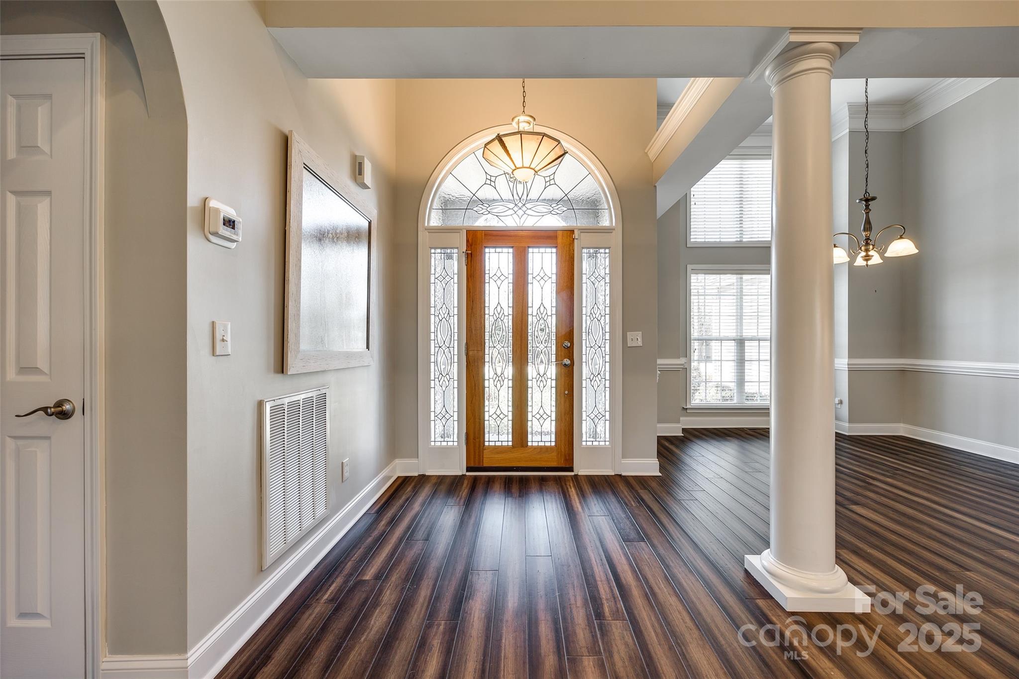 1352 North Dobys Bridge Road Fort Mill, SC 29715 - Photo 3 of 31 wooden floor in an empty room with a window