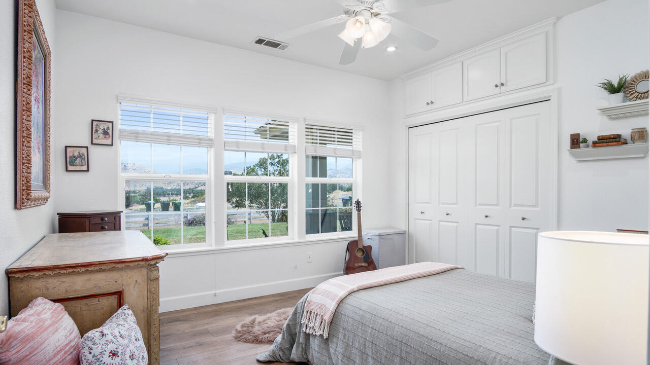 16657 Thomas Drive Springville, CA 93265 - Photo 20 of 37 a bedroom with a bed and a window