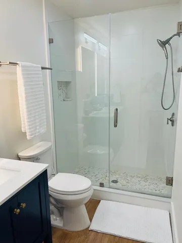 a view of a chairs and table on the deck