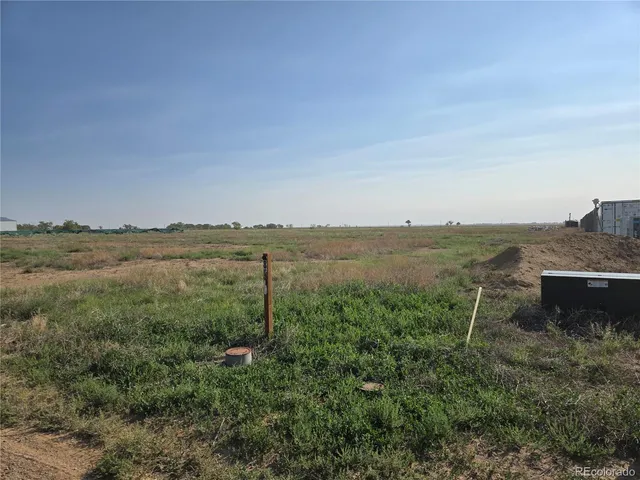 a view of a lake with mountain in the background