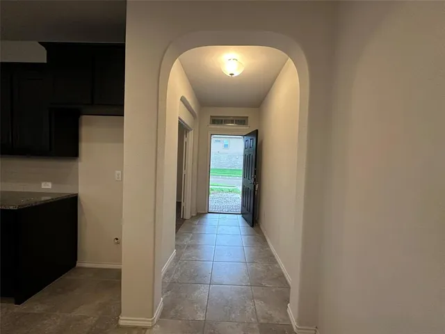 a view of a hallway from a hallway