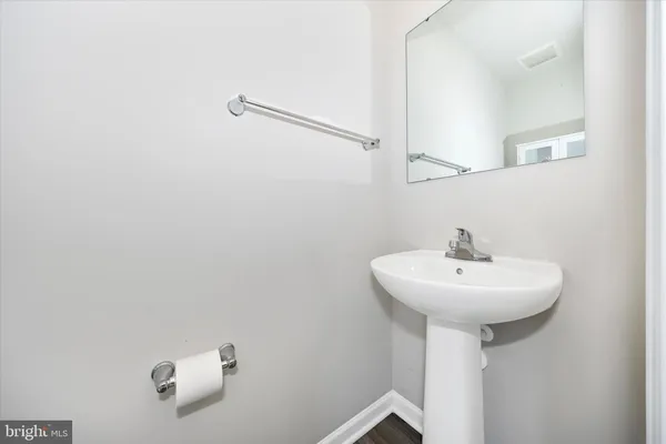 a view of a kitchen and a sink