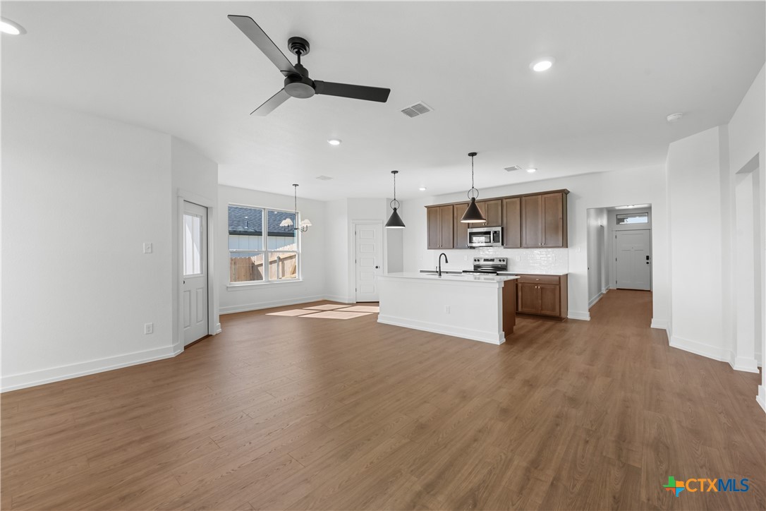 1727 Bear Grass Rdg Road Temple, TX 76501 - Photo 3 of 16 a view of kitchen with wooden floor