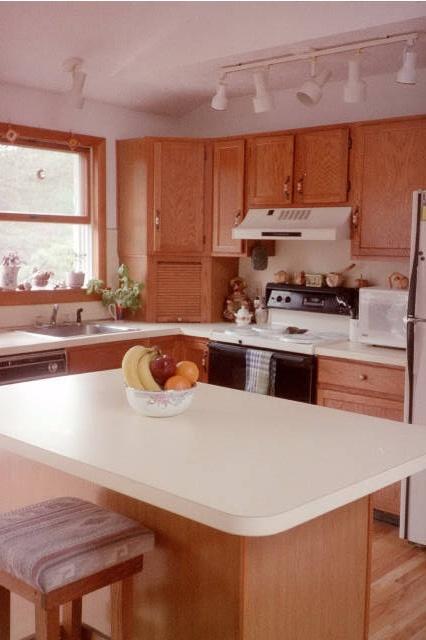 8 Clearview Road Long Pond, PA 18334 - Photo 3 of 5 a kitchen with a stove a sink and a refrigerator