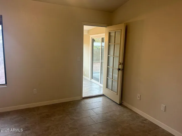 a view of a room with a large window