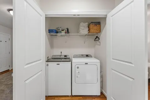 a utility room with dryer and washer