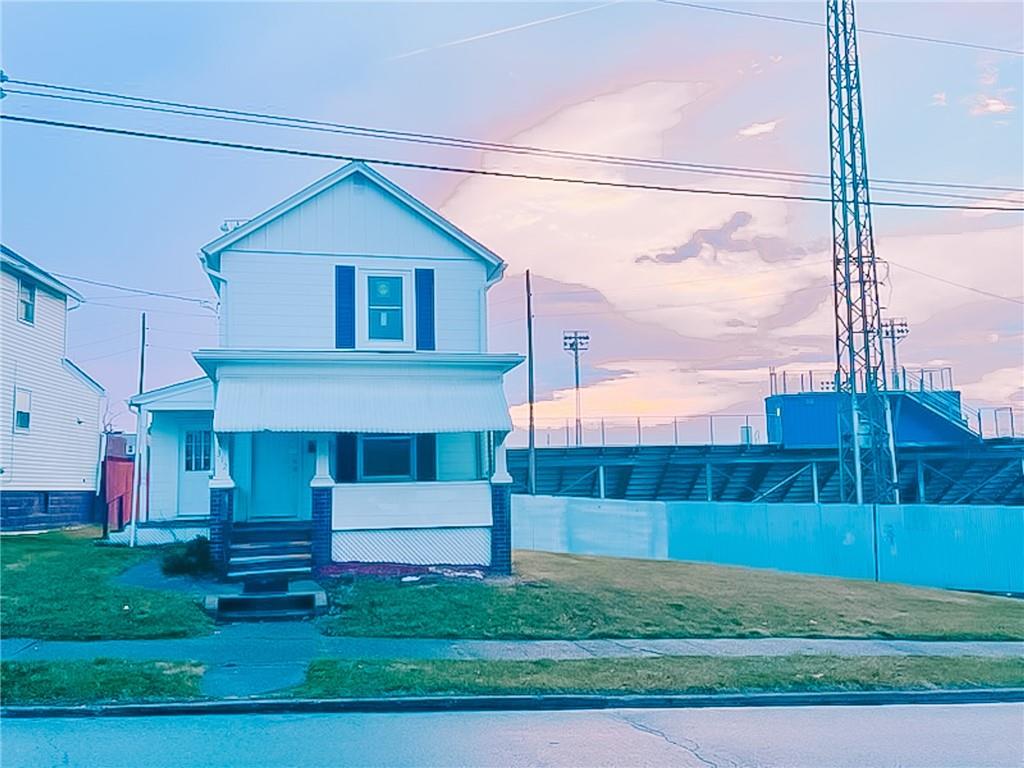 312 Jackson Avenue Vandergrift, PA 15690 - Photo 19 of 21 a front view of a house with a yard