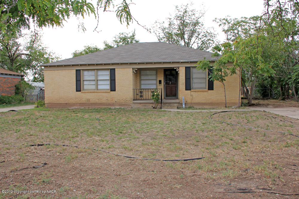 3604 South Hayden Street Amarillo, TX 79110 - Photo 3 of 21 a front view of a house with garden
