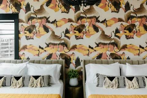 a picture of a bedroom with a bed and a couch