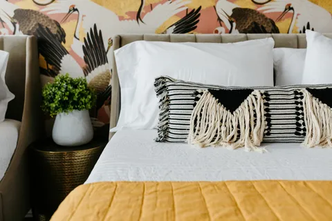 a view of living room with furniture and a large window