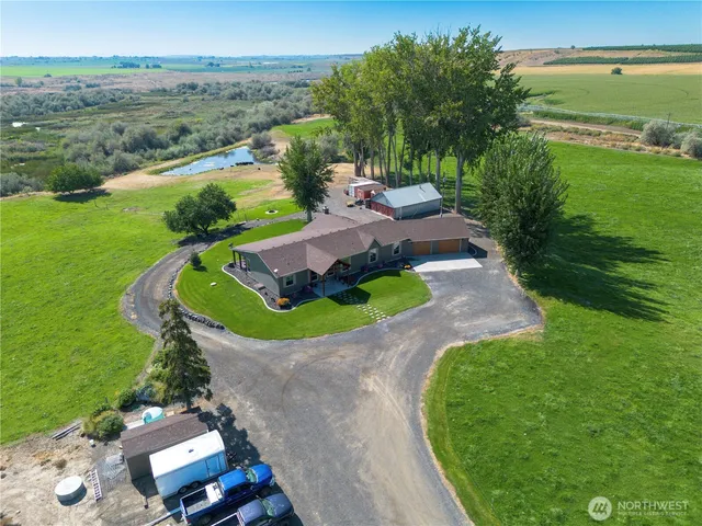 an aerial view of a house with a garden