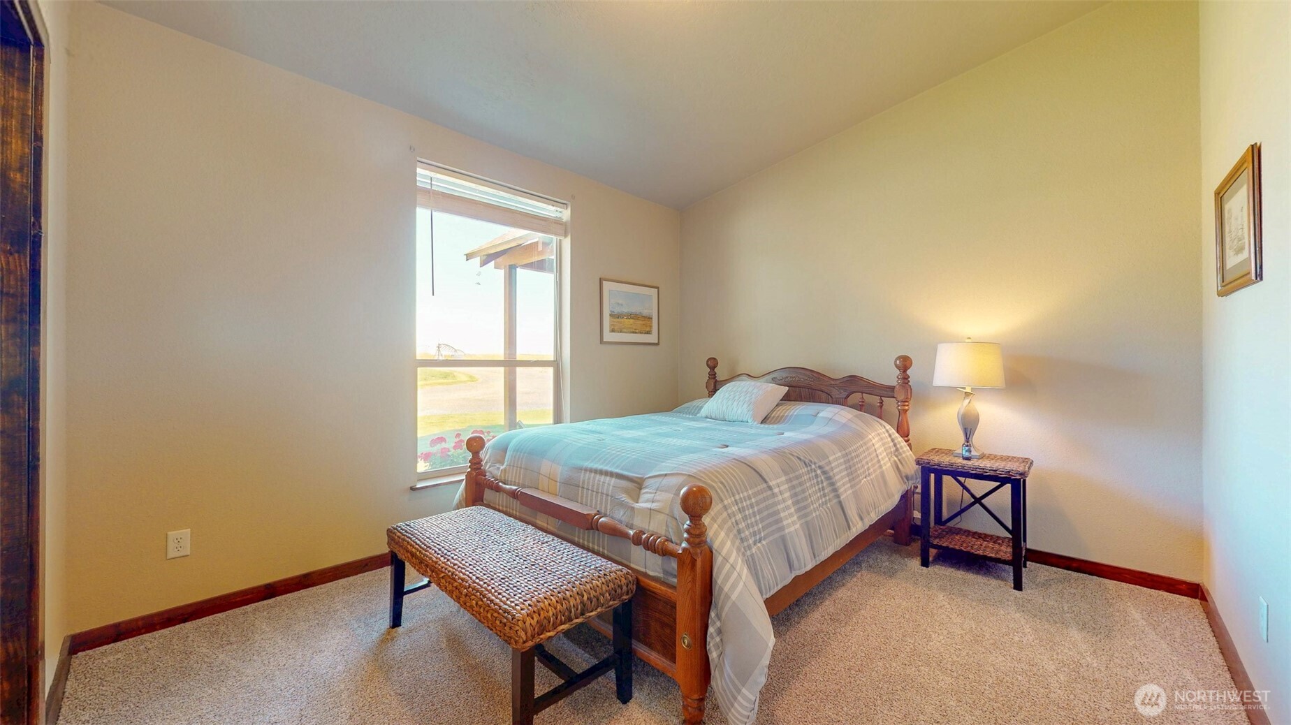 1461 Sheffield Road Mesa, WA 99343 - Photo 26 of 40 a bedroom with a bed and a window