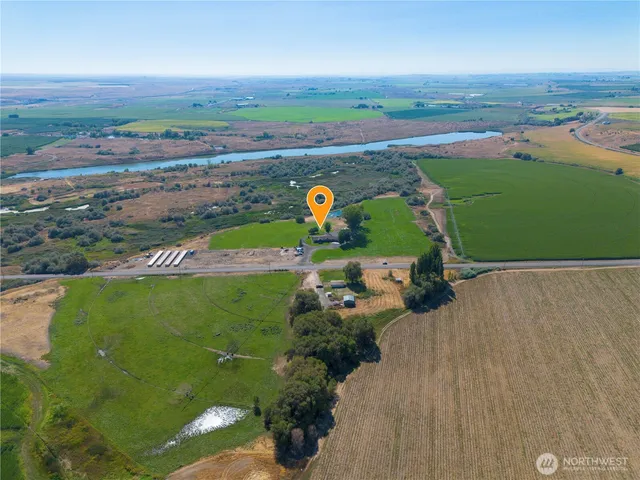 an aerial view of a golf course with a big yard