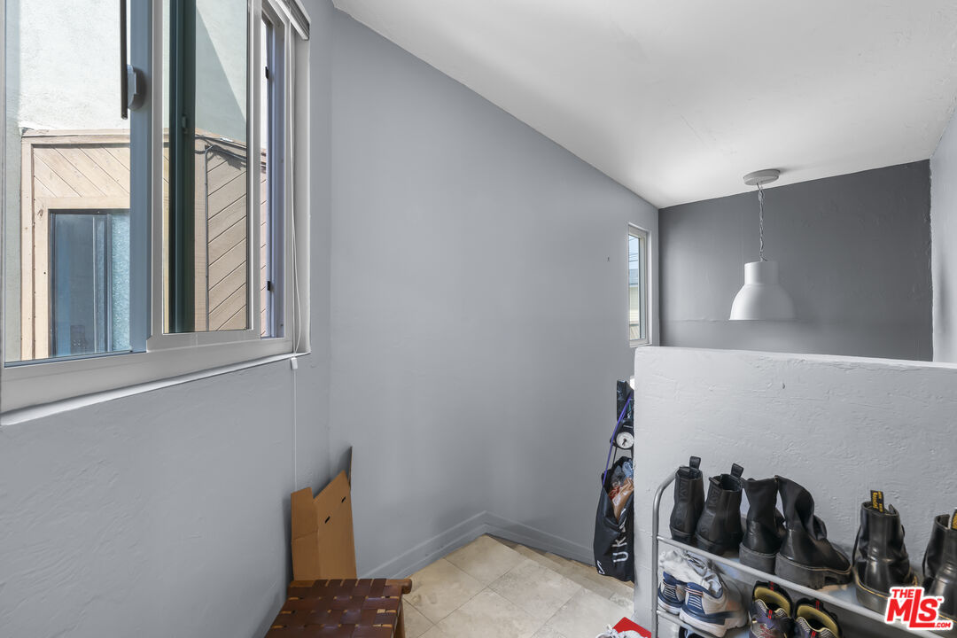 23 Buccaneer Street Marina del Rey, CA 90292 - Photo 24 of 39 a view of a room with rack on the wall
