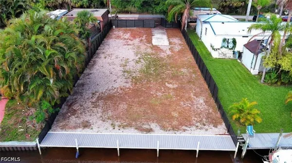 a view of yard with patio