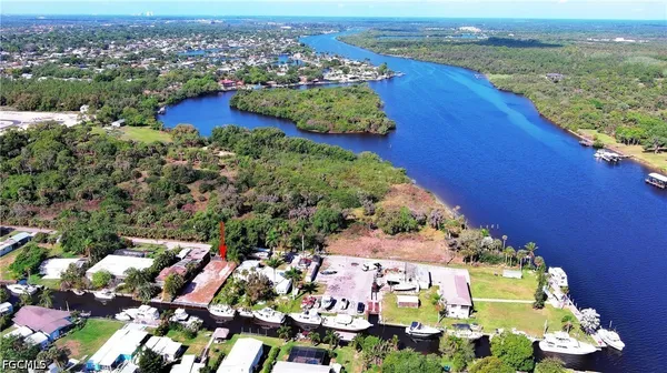 an aerial view of a houses with a outdoor space