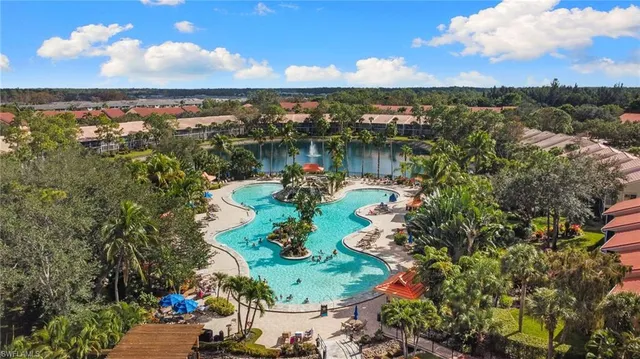 an aerial view of a houses with outdoor space