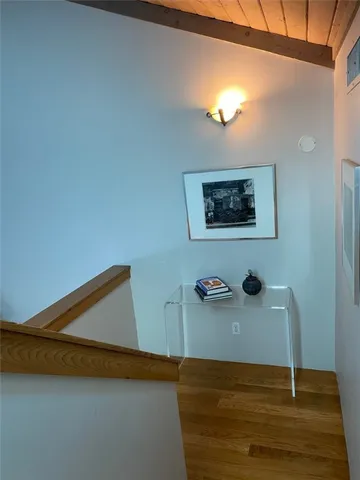 a room with a stove and a microwave