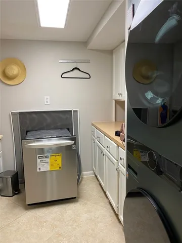 a large bedroom with a bed and walk in closet