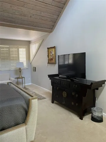 a view of a lake with boats and trees