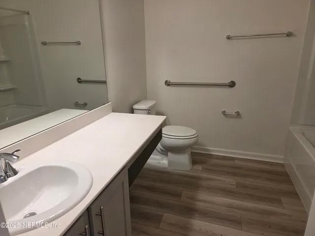 a bathroom with a sink and a toilet