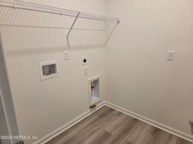 a view of a room with racks on the wall