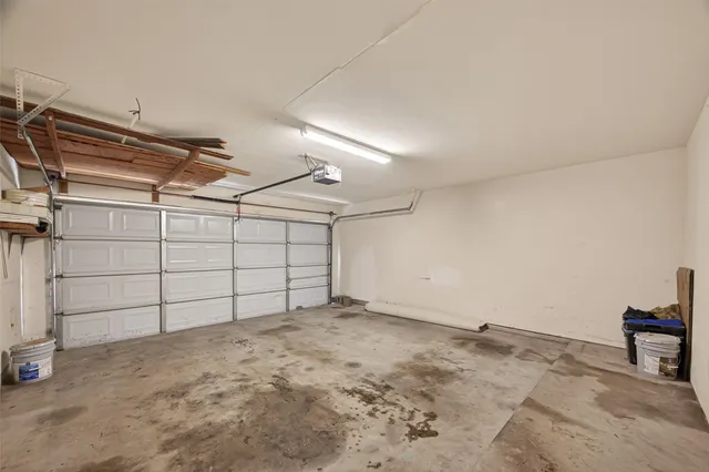 a view of a house with backyard and porch