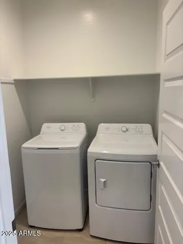 a stove top oven sitting inside of a kitchen