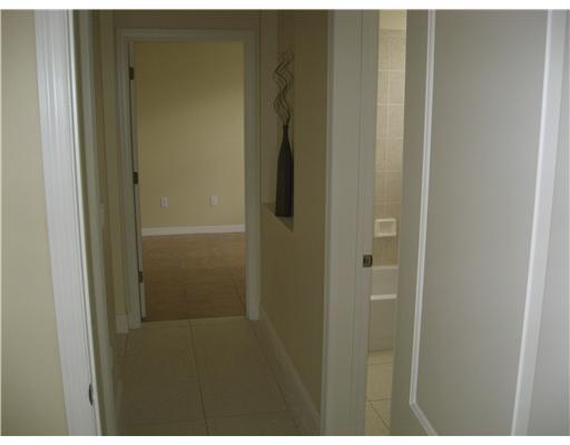 482 Northwest Emilia Way Stuart, FL 34994 - Photo 19 of 25 a bathroom with a shower