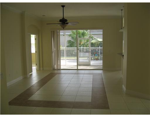 482 Northwest Emilia Way Stuart, FL 34994 - Photo 4 of 25 a view of an empty room with a window