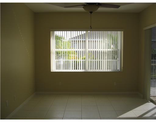 482 Northwest Emilia Way Stuart, FL 34994 - Photo 10 of 25 a view of an empty room with a window