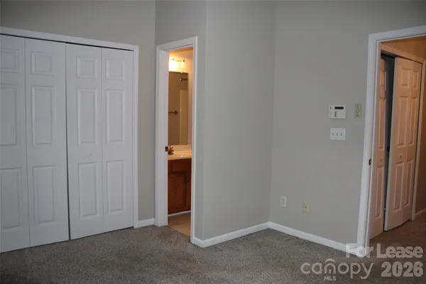 an empty room with closet