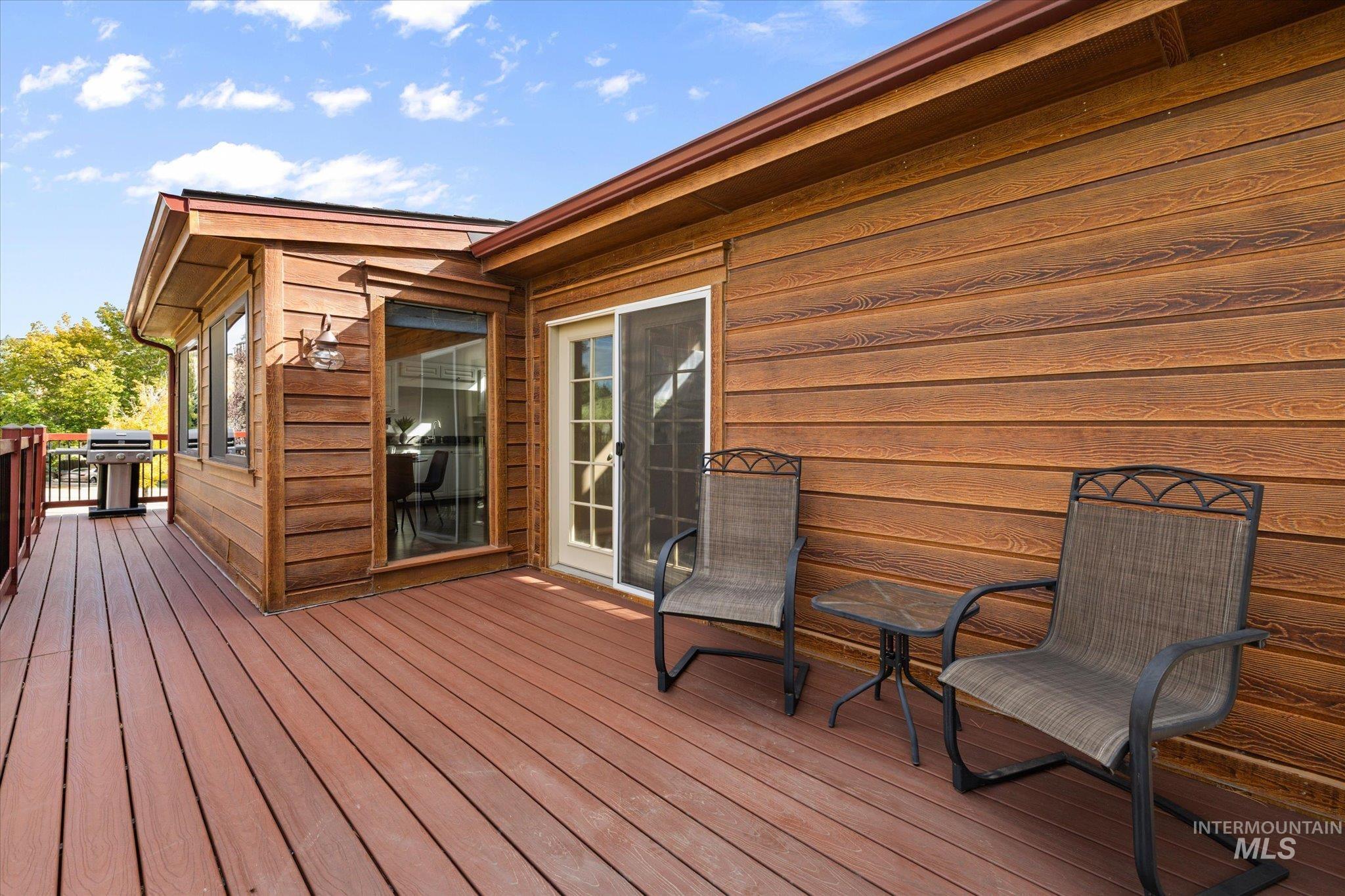2199 South Ridge Point Way Boise, ID 83712 - Photo 45 of 50 Wooden terrace with area for grilling