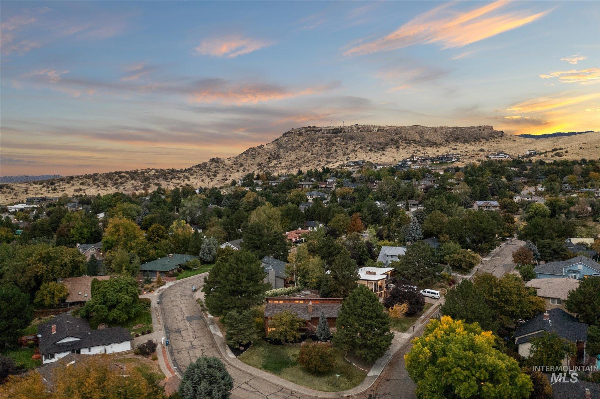 2199 South Ridge Point Way Boise, ID 83712 - Photo 49 of 50 Aerial view at dusk of a mountain view and a residential view