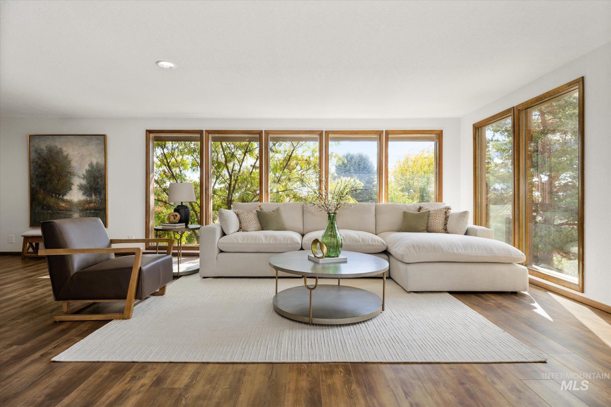 2199 South Ridge Point Way Boise, ID 83712 - Photo 9 of 50 Living room with wood finished floors and baseboards