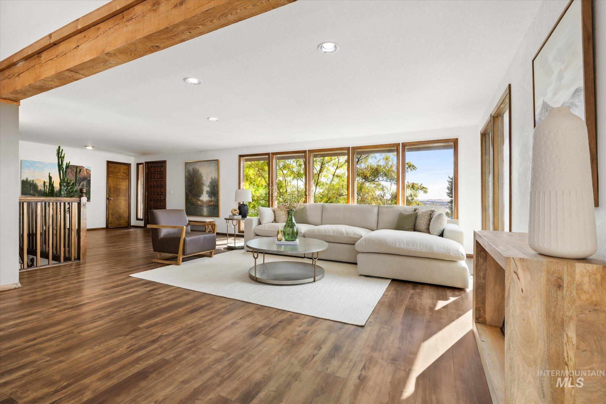 2199 South Ridge Point Way Boise, ID 83712 - Photo 10 of 50 Living area featuring wood finished floors and recessed lighting