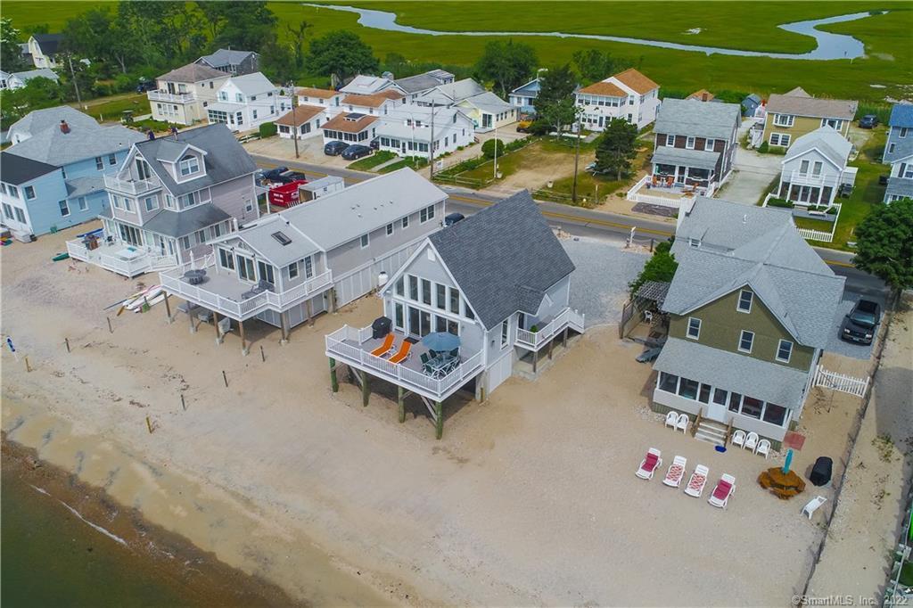 an aerial view of a house with swimming pool