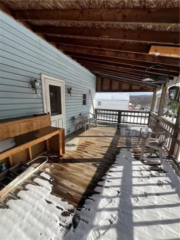 a view of backyard with deck