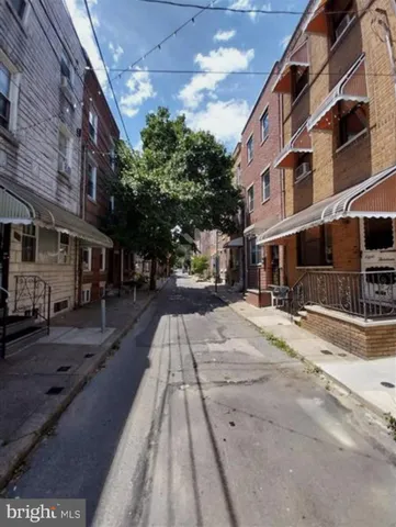 a view of a building with a street